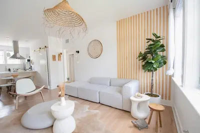 a living room with a couch and a table at Stylish 2br apt, 5 mins to the BEACH J2 in Hollywood
