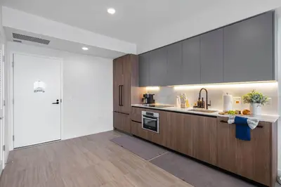 a kitchen with a sink and a counter top at Miami Beach Retreat Cozy 1BR Steps from the Shore in Miami Beach