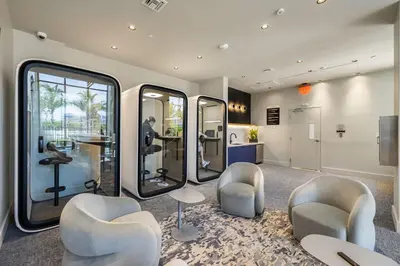 a salon with chairs and mirrors in a room at Miami Beach Retreat Cozy 1BR Steps from the Shore in Miami Beach