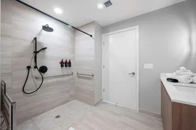 a bathroom with a shower and a sink and a shower stall at NOK Fantastic 1 BR Den in Miami in Miami Beach