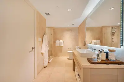 a bathroom with a sink and a toilet at Stunning Oceanfront 1BR in the 1 Hotel in Miami Beach