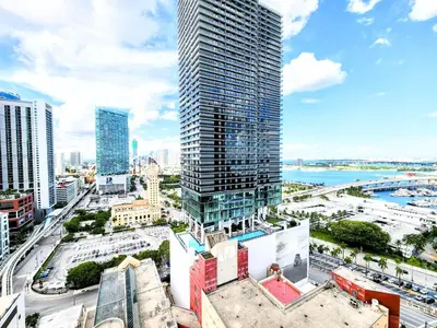 an aerial view of a city with tall buildings at 3BR Skyline Luxury with a 100 inch TV, Balcony & Prime Miami Location in Miami