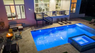 a large swimming pool in front of a house at Villa Azul Luxe Retreat in Fort Lauderdale