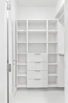 a white closet with white shelves in a room at Brand new Luxurious Villa in Hollywood