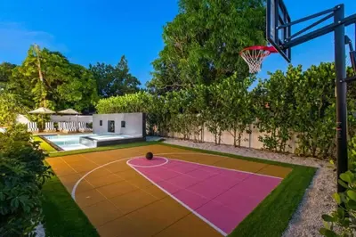an outdoor basketball court with a basketball hoop at New Construction Villa Top Location Jacuzzi Bkb CT in Miami