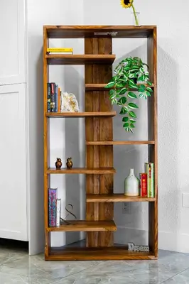 a wooden book shelf in a room with a plant at Luxury Miami Studio Next to Beach & Airport in Miami
