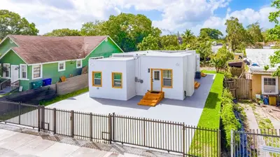 a tiny house in the backyard of a house at Modern Miami Home minutes to Wynwood & Downtown in Miami