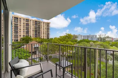 a balcony with a view of a building at Urban Escape 2 Bed Unit In Miami near Whole Foods in North Miami