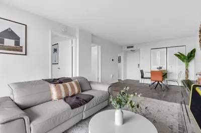 a living room with a couch and a table at Urban Escape 2 Bed Unit In Miami near Whole Foods in North Miami