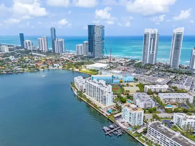 an aerial view of a city and the ocean at Waterview Luxury 2-Bedroom Condo Sunny Isles Beach in Sunny Isles Beach