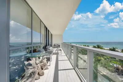 a balcony with a view of the ocean at Stunning Oceanfront 2BR W Hotel in Miami Beach