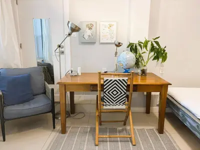 a desk with a lamp and a chair and a desk with a desk at Urban Oasis Studio, Miami near Coral Gables #5 in Miami