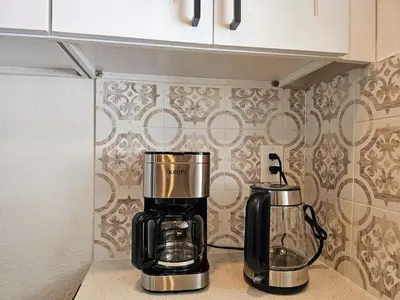 two coffeemakers sitting on a counter in a kitchen at Modern 3BR Home Near Holycross Hospital in Fort Lauderdale