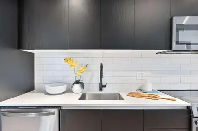 a kitchen with a sink and a counter top at MVR - 2BR Luxury Stay in the Heart of Miami in Miami