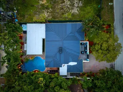 an overhead view of a building with a blue roof at Beach Pop - Steps to Beach Heated Pool & Hot Tub in Fort Lauderdale