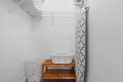 a room with a table with a basket on a shelf at Oceanfront Bliss Cozy 1BR by Beach Free Parking in Hollywood