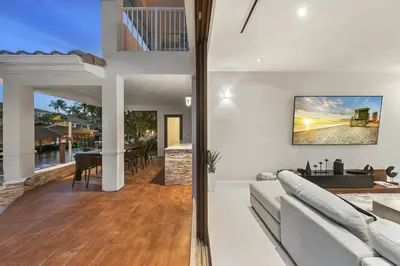 a living room with a couch and a table at Villa Costa in Hollywood