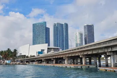 a bridge in front of a city with tall buildings at Cozy 1BR Apt Steps from Calle 8 & Mins to Brickell in Miami