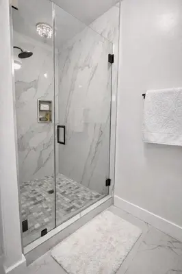a shower with a glass door in a bathroom at Villa Miami Lakes 2 in Hialeah