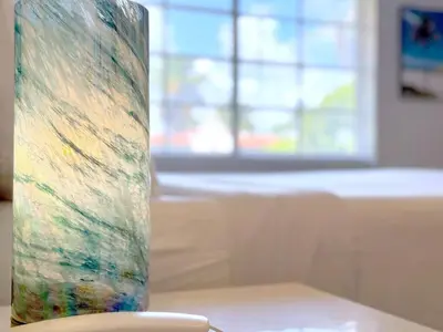 a vase sitting on top of a table at Sunny Beach Studio Steps to Ocean and Nightlife in Miami Beach