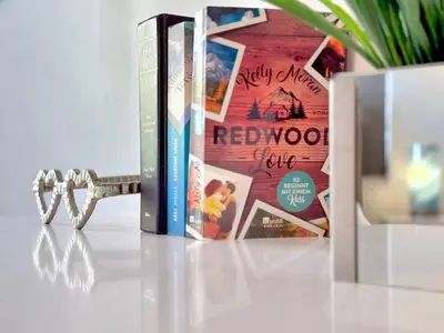 two books sitting next to each other on a table at Sunny Beach Studio Steps to Ocean and Nightlife in Miami Beach