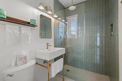 a bathroom with a sink and a shower at The Bianco in Miami