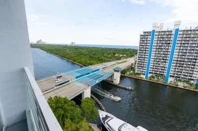 an overhead view of a bridge over a river with buildings at Luxury Waterfront Condo Hilton Hotel Amenities Beach Pool Jacuzzi Jetskis Gym in Fort Lauderdale