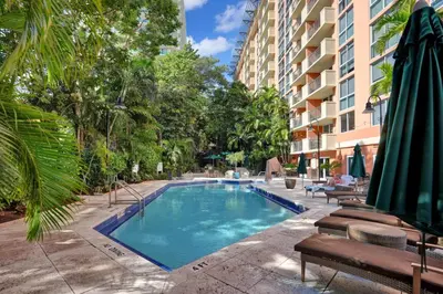 a swimming pool in the middle of a building at Bayshore Charm-Free Parking in Miami