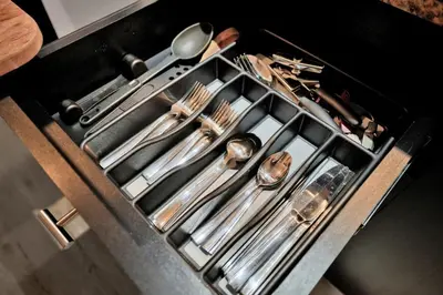 a bunch of utensils are sitting on a stove at Grove Escape-Ocean Glimpse in Miami