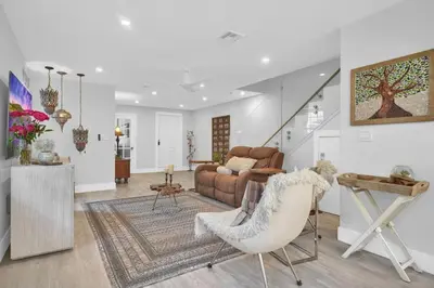 a living room with a couch and a table at Home Away From Home in Coconut Grove in Miami