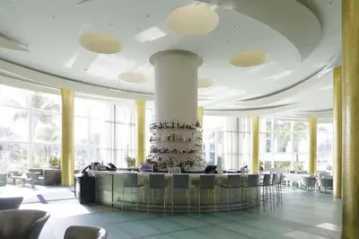 a wedding cake on a table in a building at Fontainebleau Sorrento Jr suite in Miami Beach