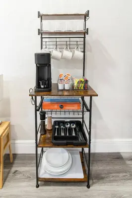 a kitchen cart with a coffee maker on it at Cozy Modern Studio Near Sunny Isles & Bal Harbour in North Miami