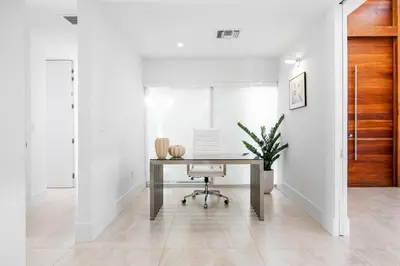 an office with a desk and a chair at Miami Modern Heated Pool and Dock in Sunny Isles Beach