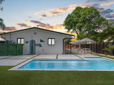 a house with a swimming pool in the yard at Miami Escape Parking Pool Near Wynwood in Miami
