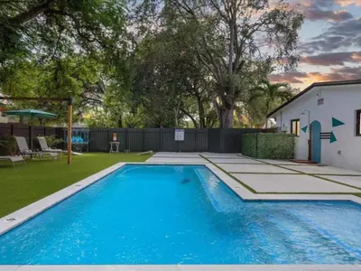 a swimming pool in the backyard of a house at Miami Escape Parking Pool Near Wynwood in Miami