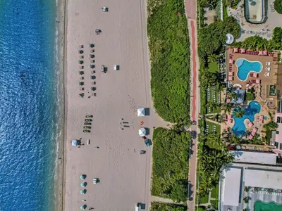an overhead view of a beach next to the water at Miami Beach Paradise 4BR Stylish condo with Resort Perks 1007 in Miami Beach