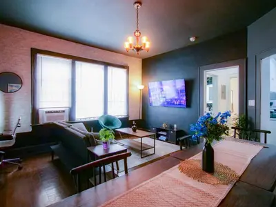 a living room with a couch and a table at Cozy 2Bed 1Bath in Edgewater Miami in Miami