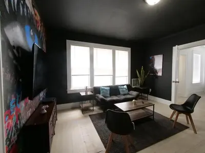 a living room with a couch and a table at Stylish Miami retreat-Edgewater in Miami