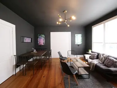 a living room with a couch and a table at Central & Stylish Miami Getaway in Miami
