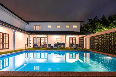 a swimming pool in the backyard of a house at Villa Asher - Waterfront with dock in Miami