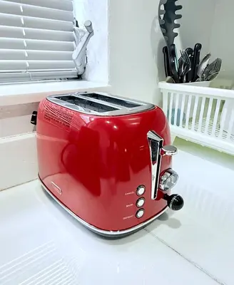 a red toaster sitting on a kitchen counter at OCEAN DRIVE-Beach Art Deco-2Queen,Cocina,Tv Wifi in Miami Beach
