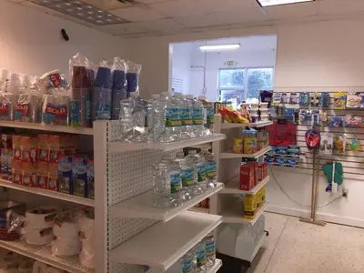 a store filled with lots of water bottles on shelves at Ocean Reserve STR-01045 in Miami Beach