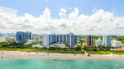 an aerial view of a beach and buildings at Amazing View 1 Hotel Corner Unit 2BR/2BA w Balcony in Miami Beach