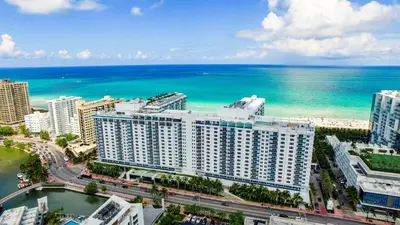 an aerial view of a resort and the ocean at Amazing View 1 Hotel Corner Unit 2BR/2BA w Balcony in Miami Beach