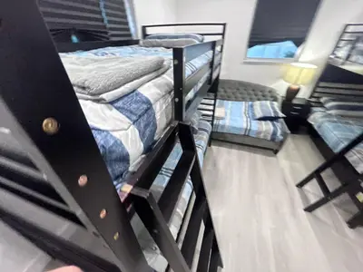 a couple of bunk beds in a room at Place to stay in Hallandale Beach