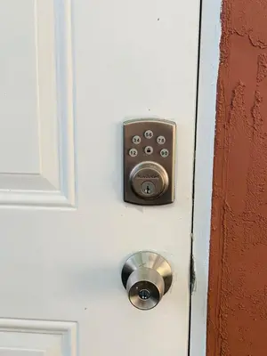 a door with a lock on a white door at Zen Garden Studio in Hollywood