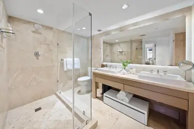 a bathroom with a sink and a toilet and a shower at Oceanview Private Residence at 1 Hotel and Homes - 1202 in Miami Beach