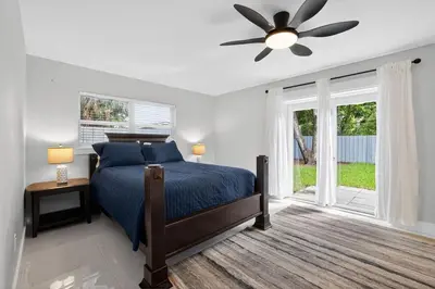a bedroom with a bed and a ceiling fan at 2BR Home Near Wilton Manors & Downtown in Fort Lauderdale