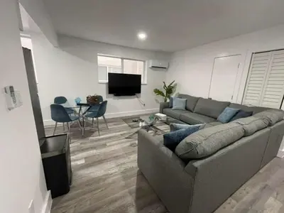 a living room with a couch and a table at KING OF MIAMI - 1 mile from Brickell 2BD Apartment! in Miami