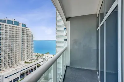 a balcony with a view of the ocean at 2BR W Residence 18th Floor, Ocean, Inter-coastal, & City Views in Fort Lauderdale